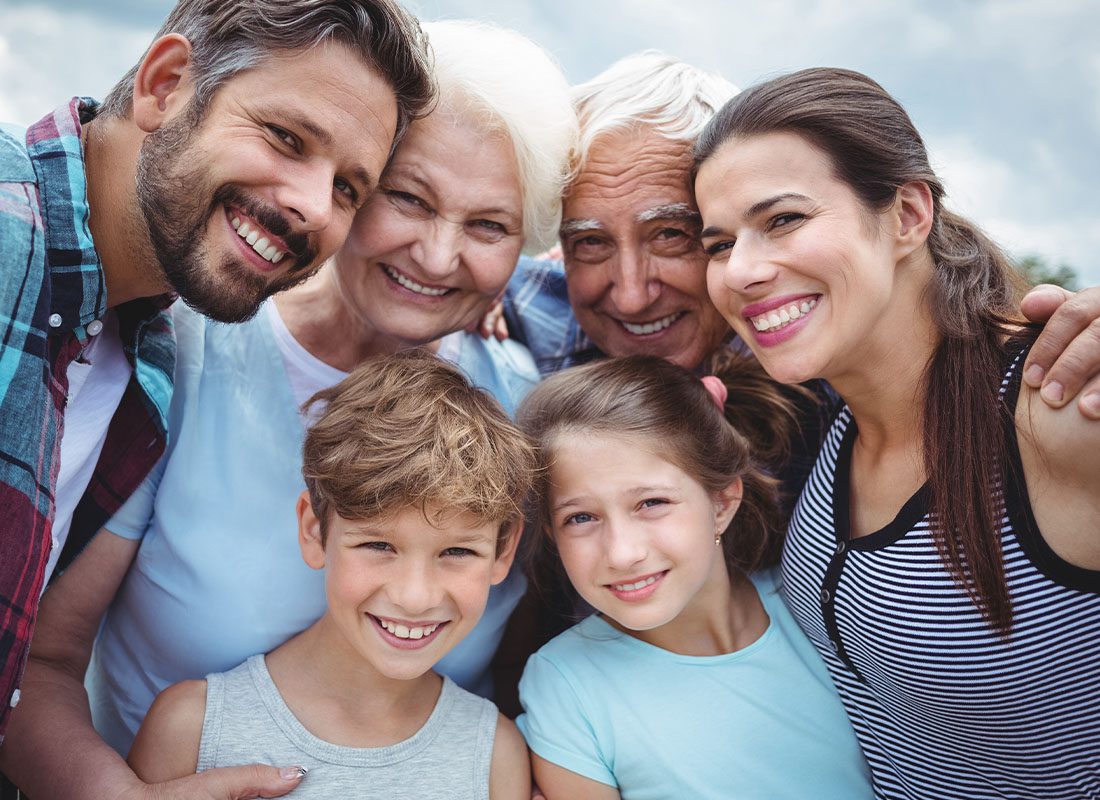 Personal Insurance - Generational Family Portrait While Outdoors