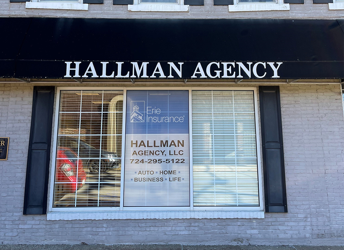 Read Our Reviews - Close Up of Hallman Agency Store Front in Pittsburg on a Nice Day